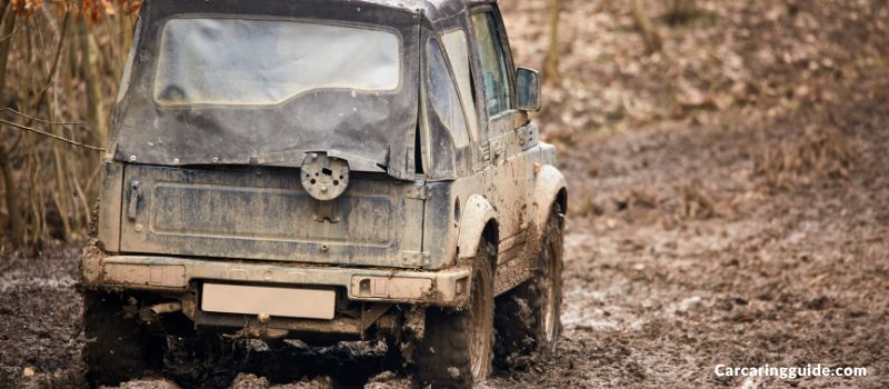 a-car-parked-in-muddy-area